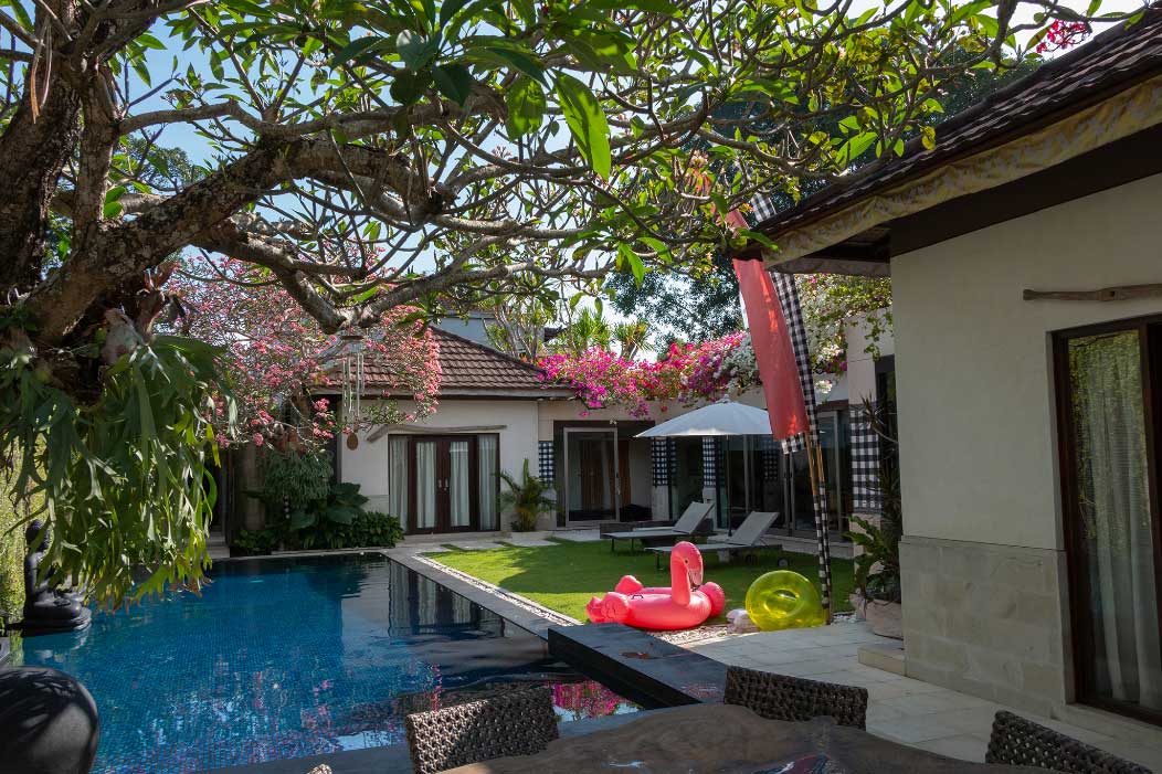 Private pool within the tropical villa garden