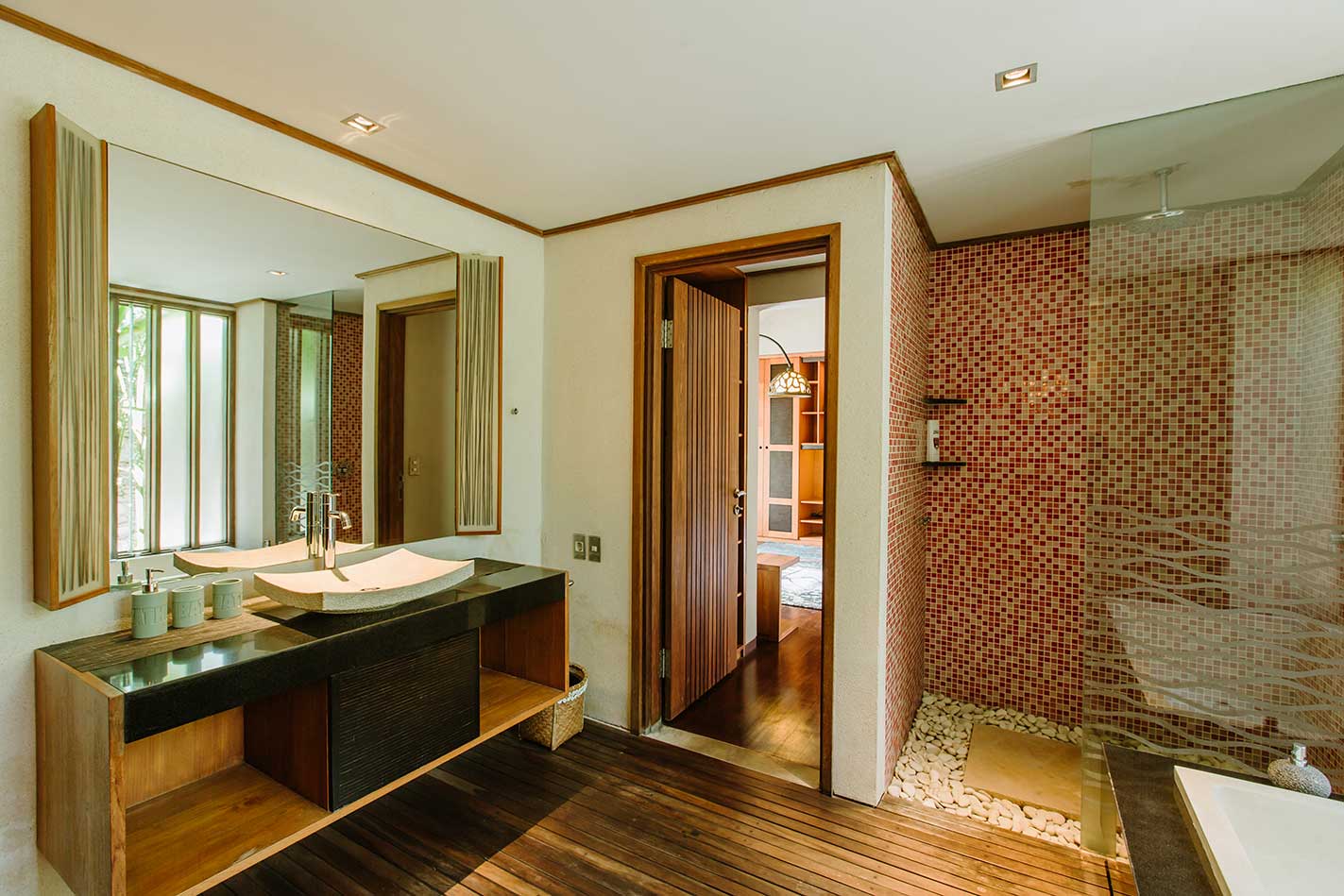 Bathroom with double vanity and timber cabinetry
