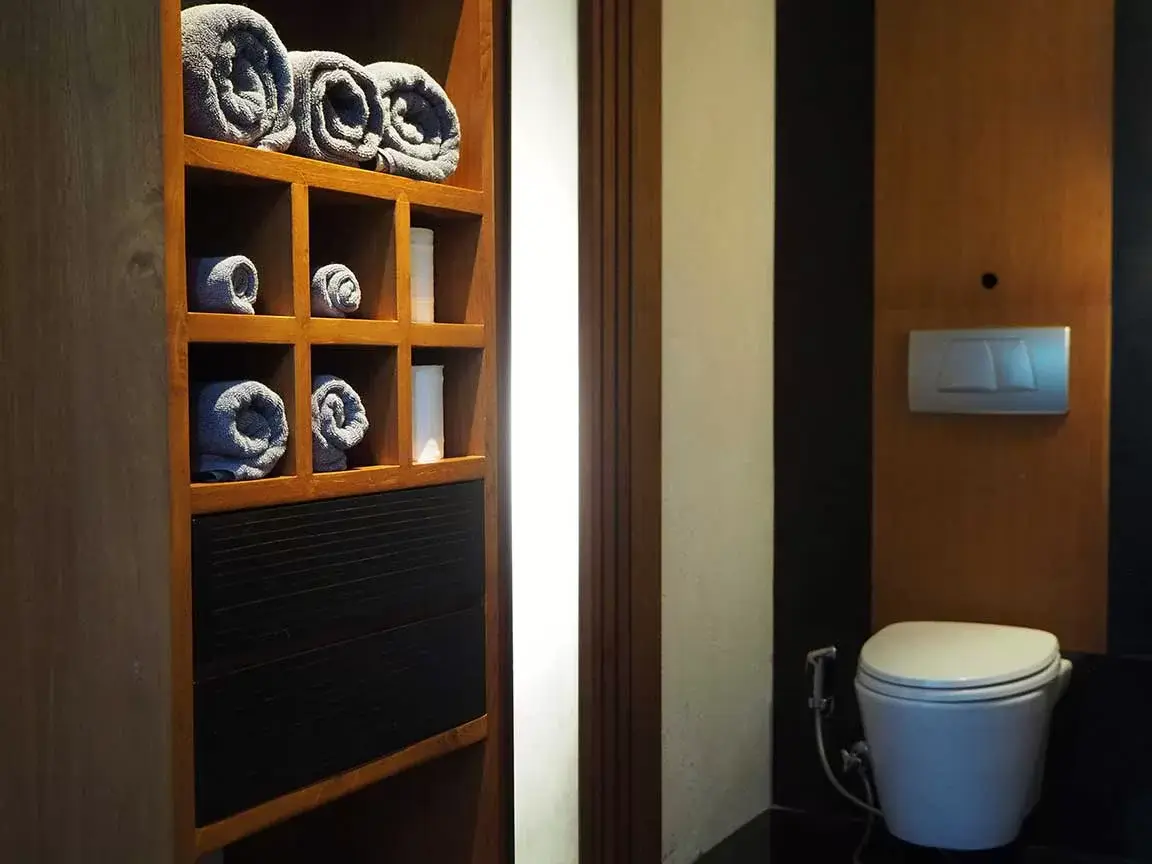 Villa bathroom with timber storage