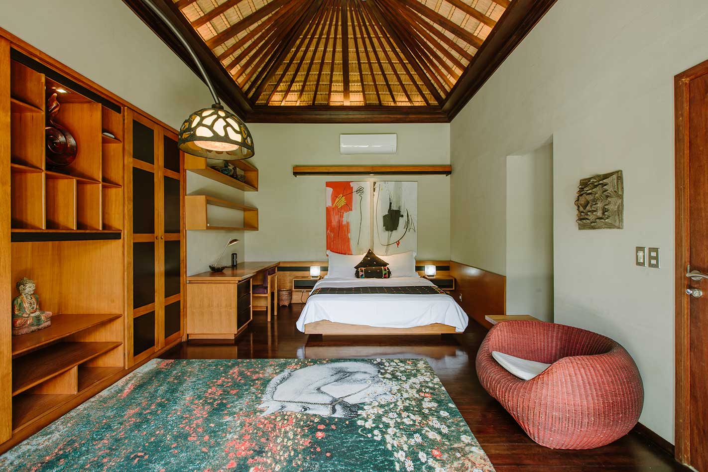 Bedroom with garden artwork and timber details
