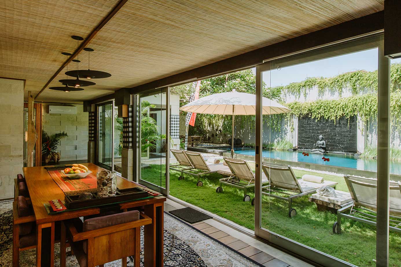 Dining table overlooking the private pool