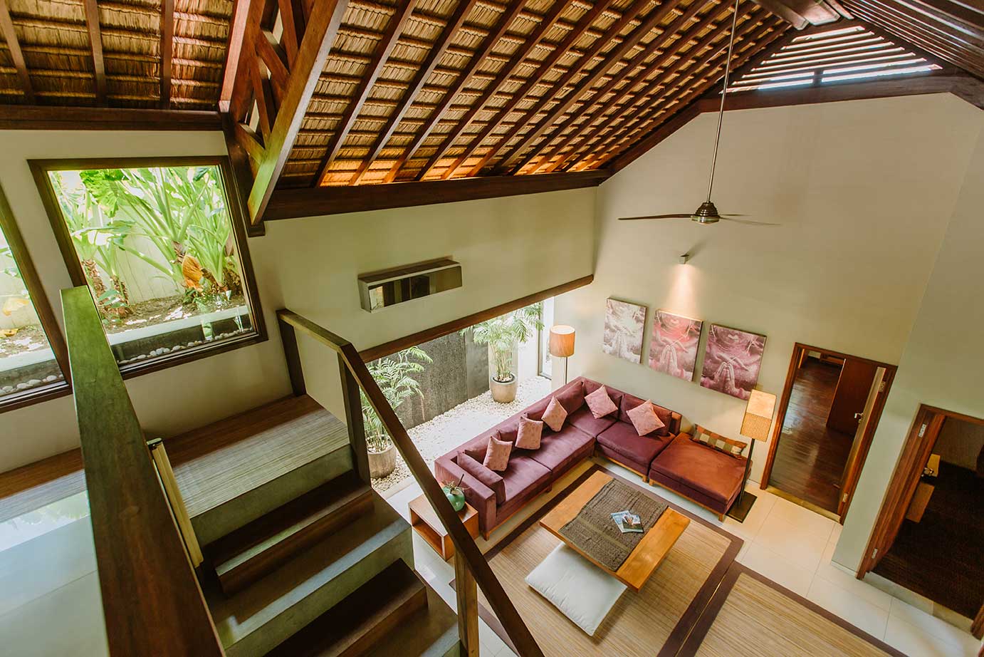 Living room with vaulted ceiling and stepped floor